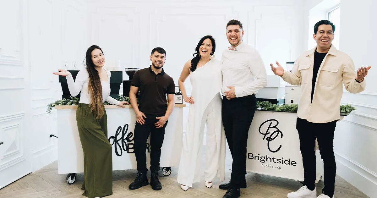 The Brightside Coffee Bar barista team beside their Houston coffee catering cart