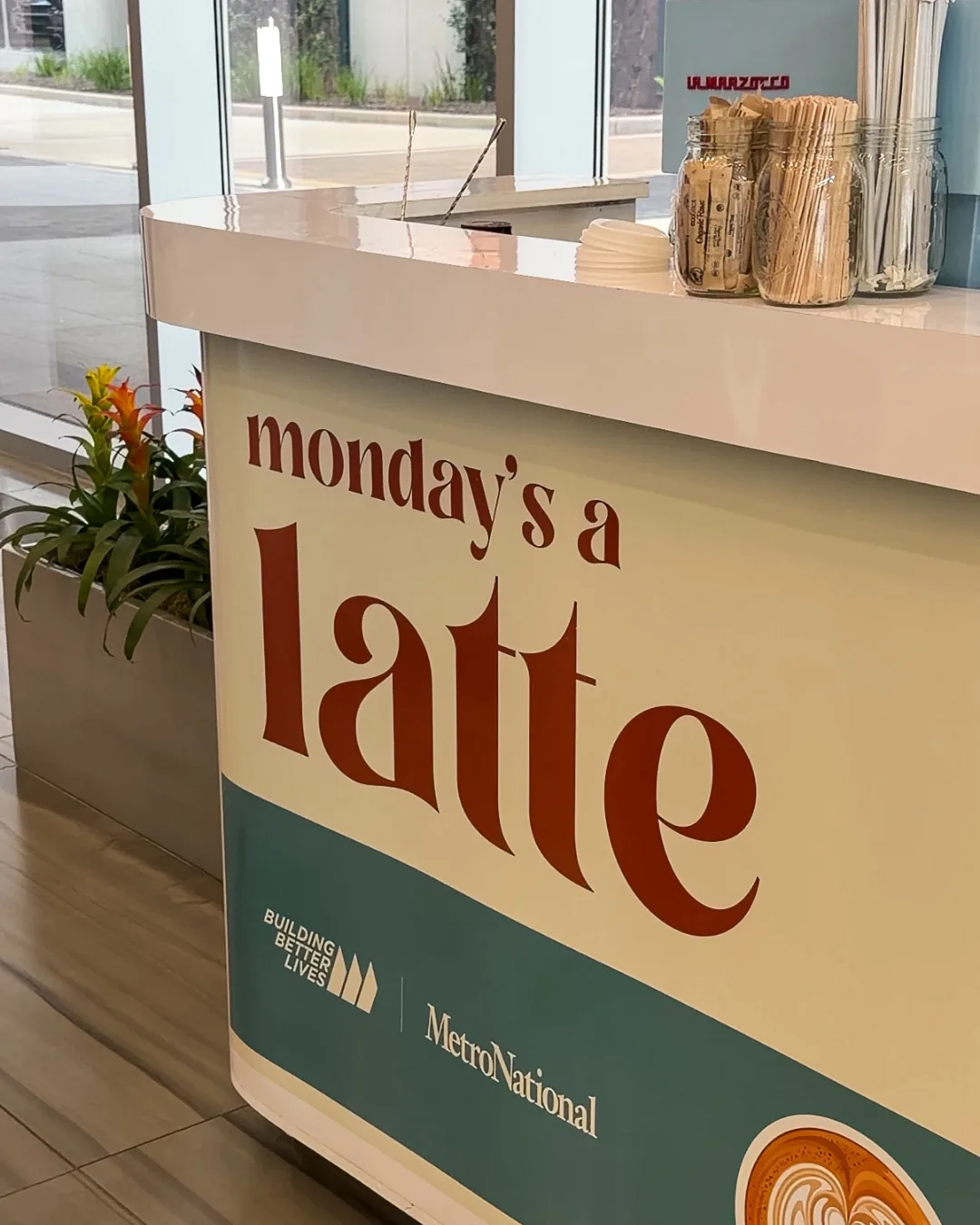 Branded Brightside coffee cart with custom Monday's A Latte signage at a Houston office